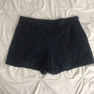 Floral navy blue shorts.